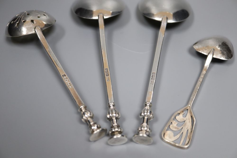 A pair of George V silver seal top serving spoons by Mappin & Webb, a silver sifter spoon, pair of silver tongs etc.